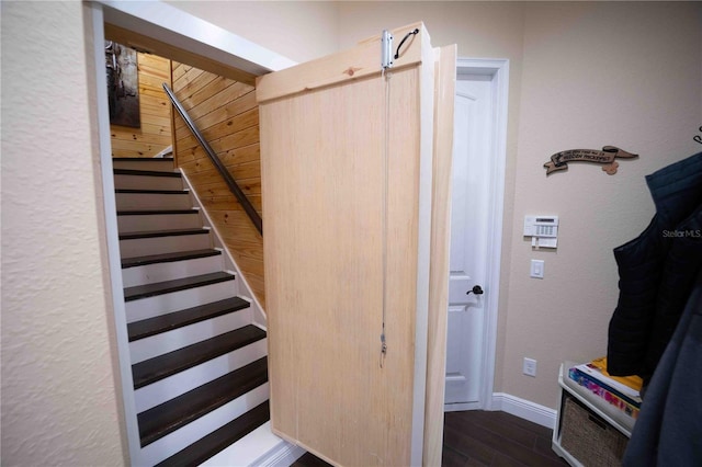 stairway with wood-type flooring