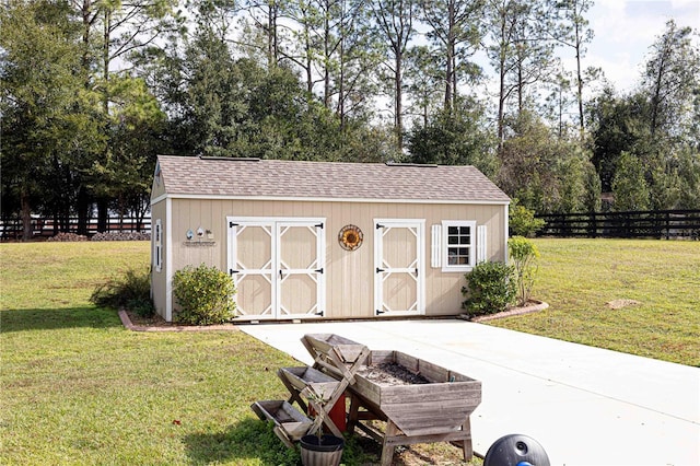 view of outdoor structure with a lawn