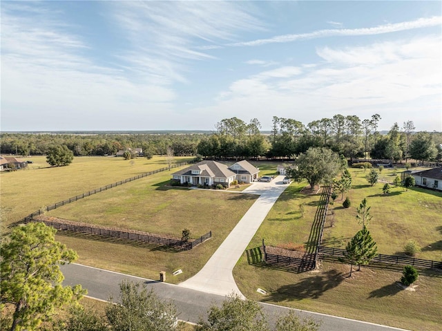 birds eye view of property with a rural view