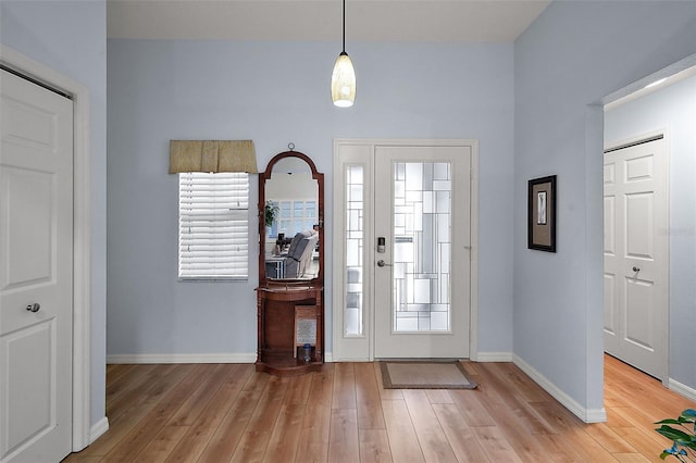 entrance foyer with light hardwood / wood-style floors