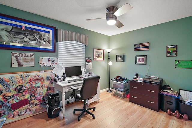 office area featuring light wood-type flooring and ceiling fan