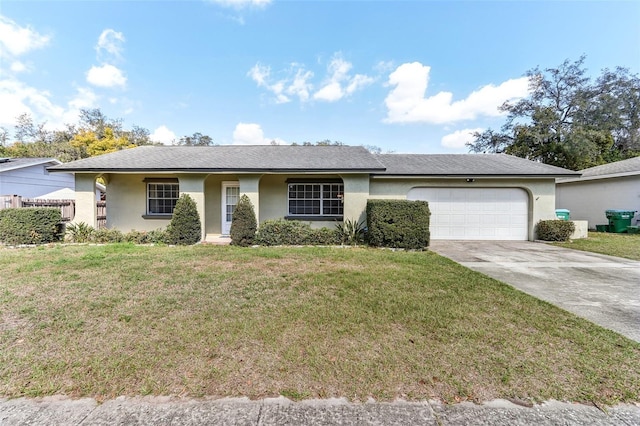 ranch-style house with a garage and a front yard