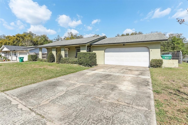 ranch-style house with a garage and a front yard