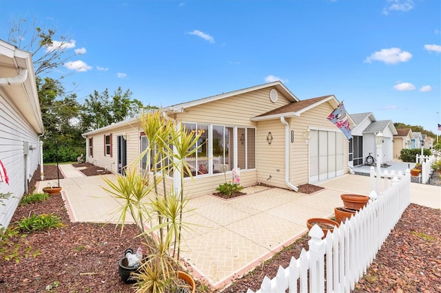 view of front of home featuring a patio