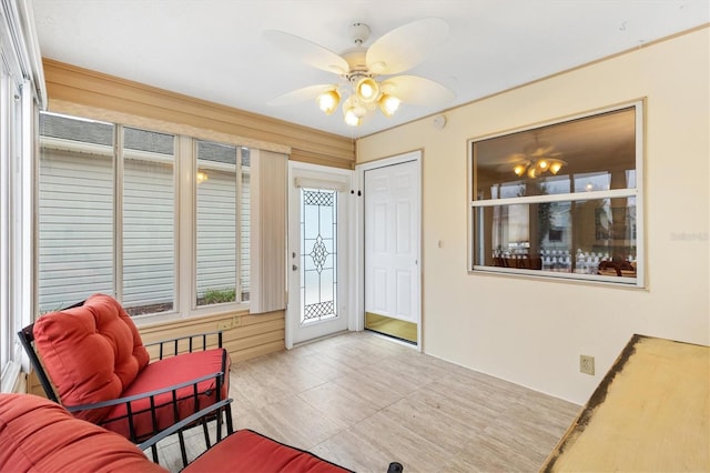 entrance foyer featuring ceiling fan