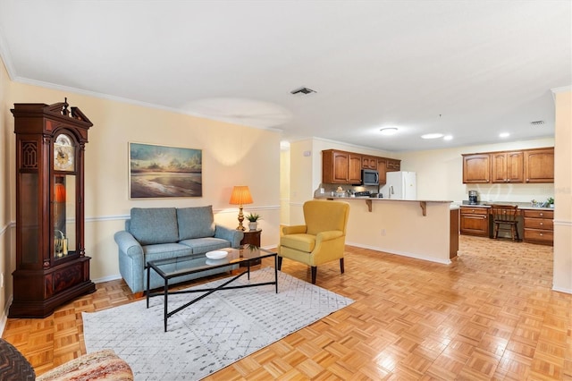 living room featuring crown molding and light parquet flooring