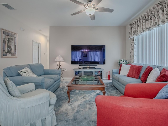 living room featuring ceiling fan