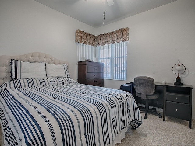 bedroom featuring ceiling fan and light colored carpet