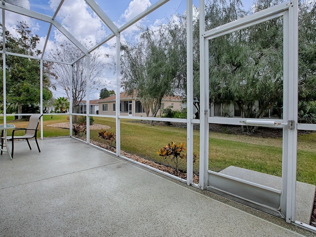 unfurnished sunroom featuring plenty of natural light