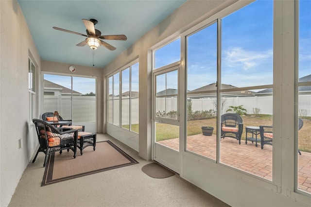 sunroom / solarium with ceiling fan