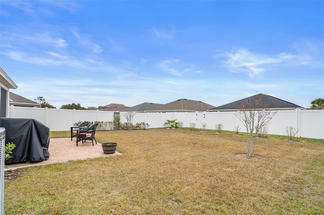 view of yard with a patio area