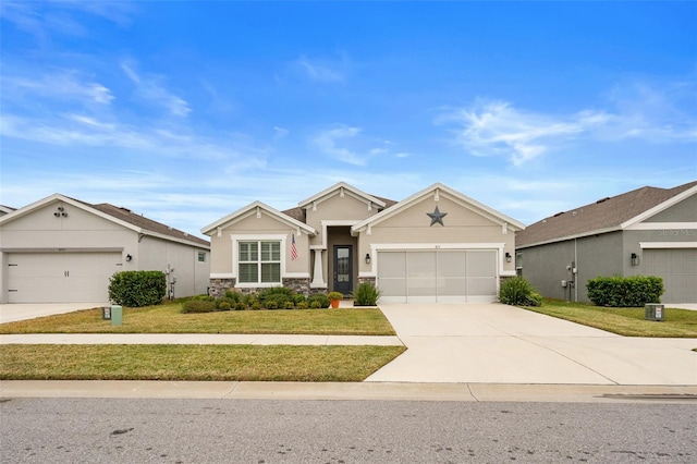 ranch-style home with a front lawn and a garage