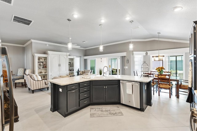 kitchen featuring dishwasher, an island with sink, and pendant lighting