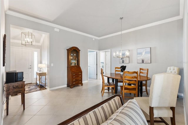 tiled dining space with a notable chandelier and ornamental molding