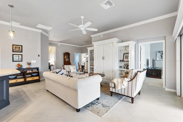 living room featuring ceiling fan, light tile patterned flooring, and ornamental molding