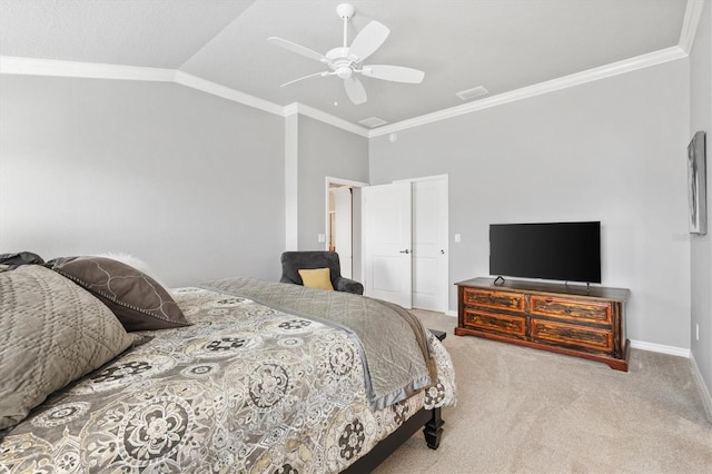 bedroom with vaulted ceiling, ceiling fan, carpet flooring, and ornamental molding