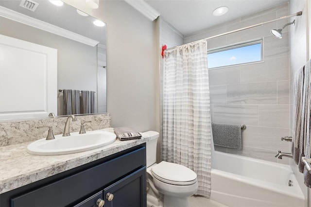 full bathroom with toilet, vanity, ornamental molding, and shower / tub combo