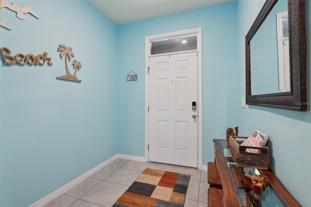 doorway with light tile patterned floors