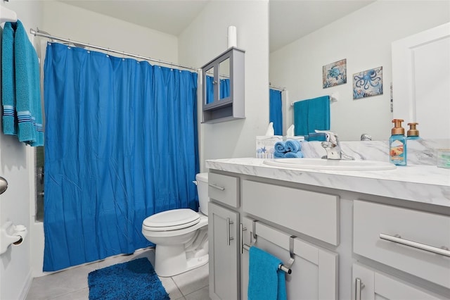 full bathroom with vanity, tile patterned flooring, toilet, and shower / bathtub combination with curtain