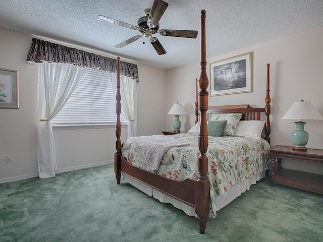 carpeted bedroom featuring ceiling fan and a textured ceiling