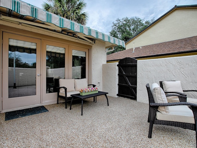 view of patio featuring french doors