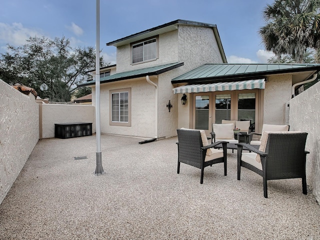 rear view of house featuring a patio area