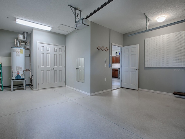 garage with water heater and a garage door opener