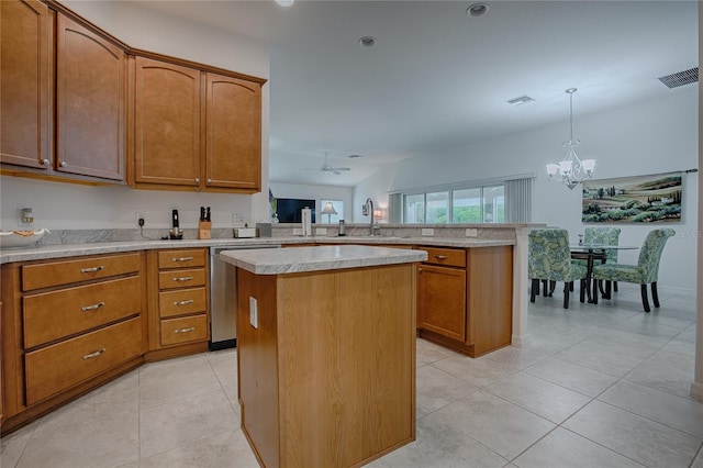 kitchen with decorative light fixtures, dishwasher, a center island, and kitchen peninsula