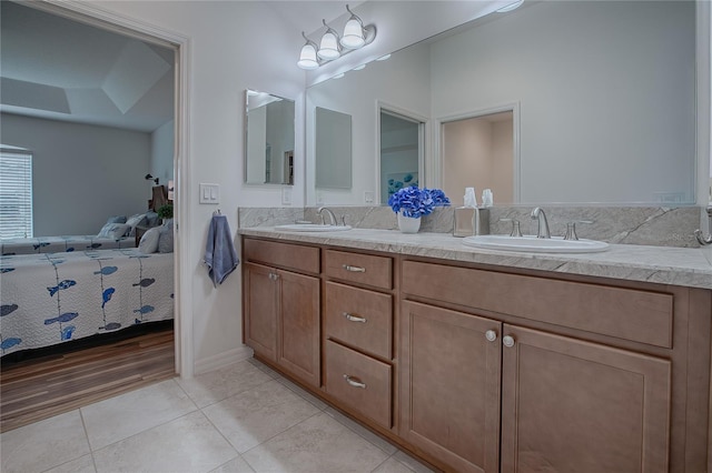 bathroom with vanity and tile patterned floors