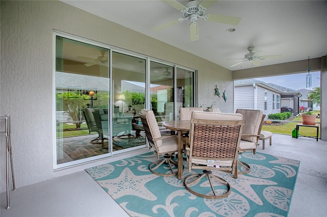 sunroom / solarium with ceiling fan