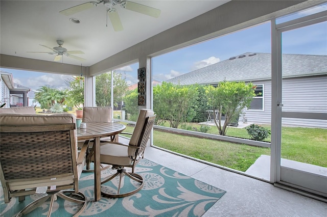 sunroom / solarium with ceiling fan