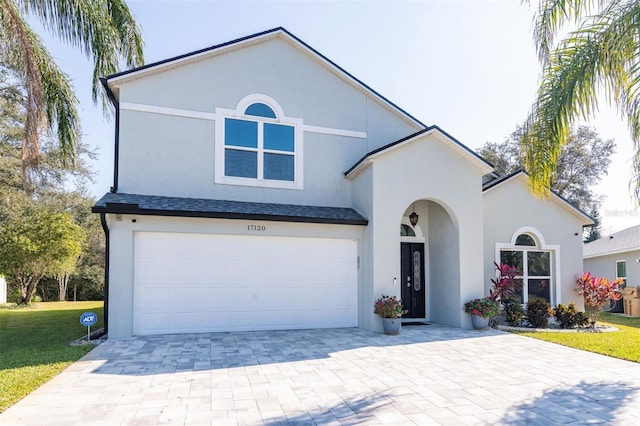 view of front of property with a garage