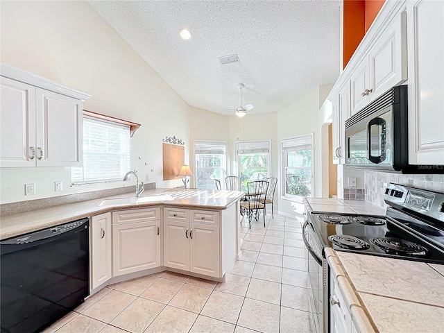 kitchen featuring sink, white cabinets, ceiling fan, and black appliances