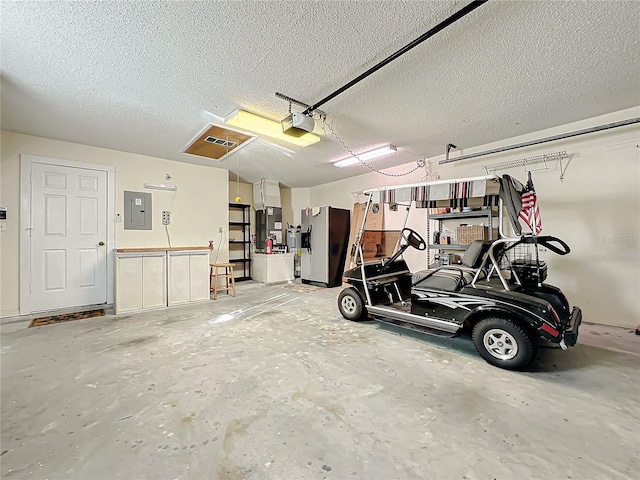 garage with a garage door opener, stainless steel refrigerator with ice dispenser, and electric panel