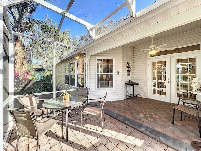 exterior space featuring ceiling fan and french doors