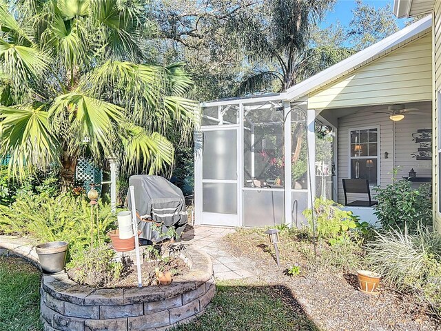 exterior space featuring a sunroom