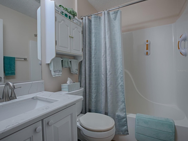 full bathroom featuring toilet, vanity, shower / tub combo with curtain, and a textured ceiling