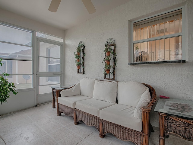 interior space with ceiling fan and a healthy amount of sunlight