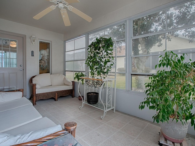 sunroom / solarium with ceiling fan