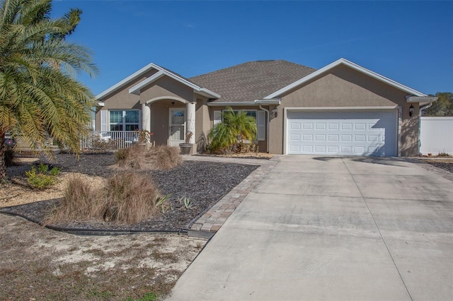 ranch-style home with a garage