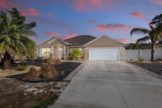 single story home with a garage