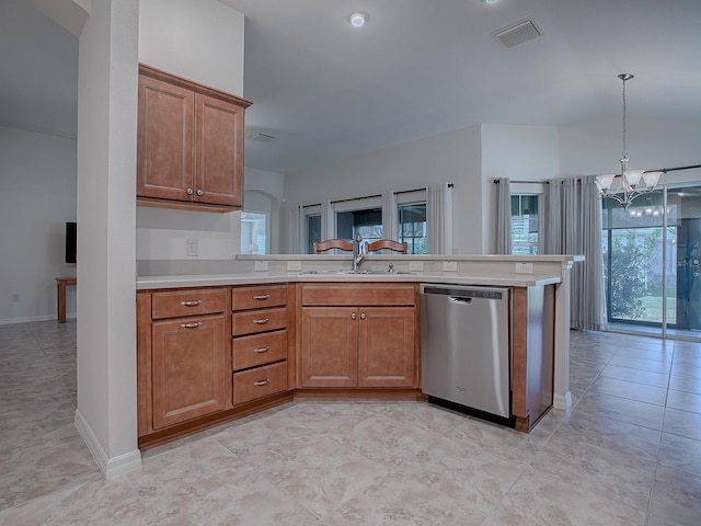 kitchen featuring stainless steel dishwasher, decorative light fixtures, sink, and a chandelier