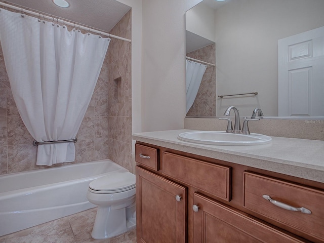 full bathroom with toilet, vanity, tile patterned flooring, and shower / tub combo with curtain