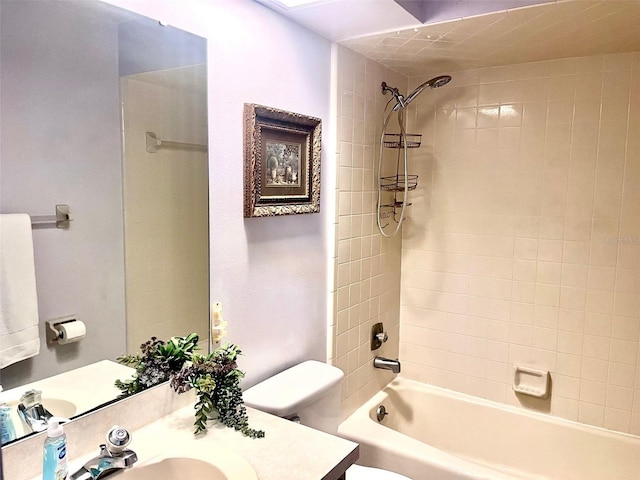 full bathroom featuring toilet, bathtub / shower combination, and vanity