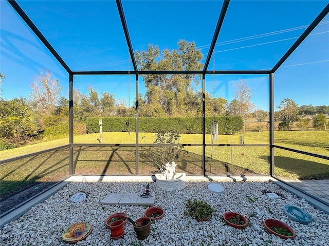 view of yard with glass enclosure