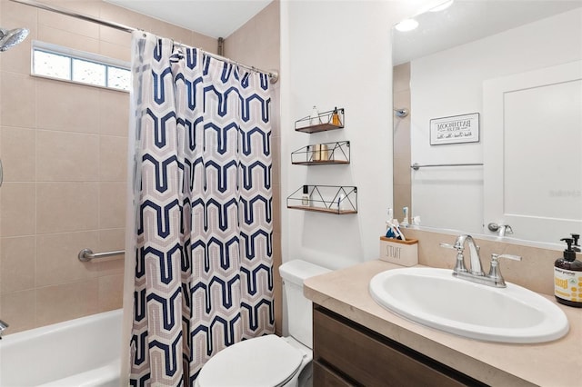 full bathroom featuring toilet, shower / bathtub combination with curtain, and vanity