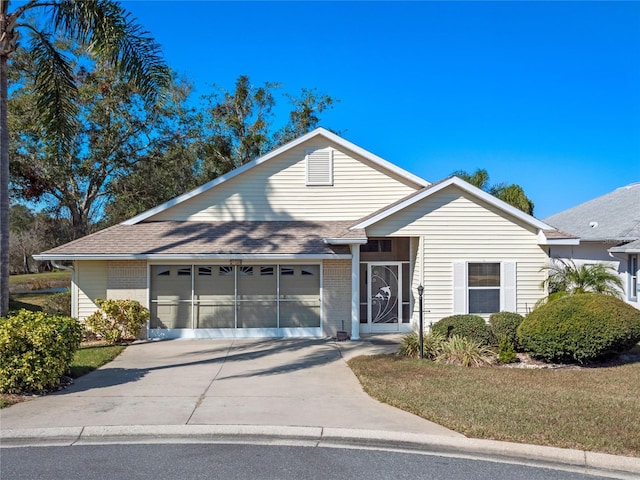 view of front of property with a garage