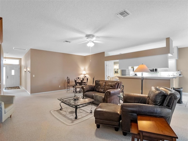 living room featuring ceiling fan