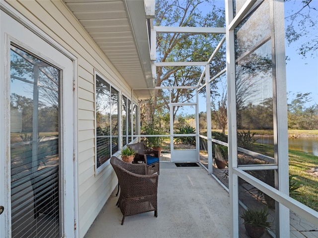 sunroom with a water view