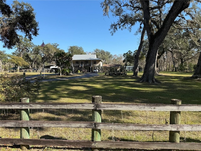 surrounding community featuring a lawn